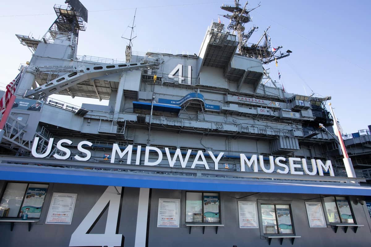 San Diego City Card – USS Midway Museum and 3 other attractions Exterior of the USS Midway Museum ship with large "41" and "USS Midway Museum" text, control towers, and multiple windows visible.