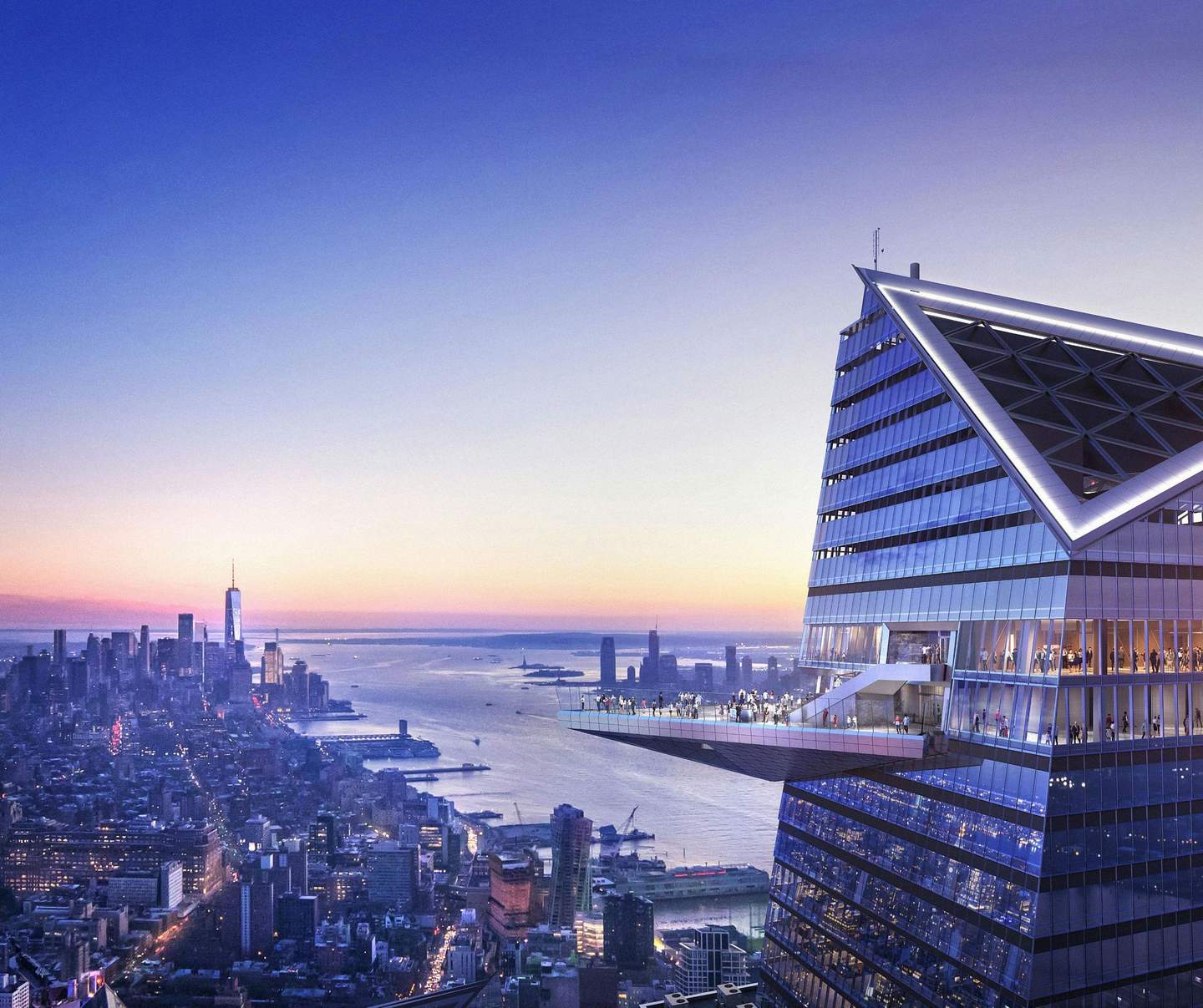 High-rise building with triangular observation deck, people, and glass railings on the right. Cityscape and sunset in the background.