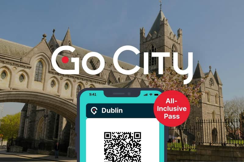 Dublin All-Inclusive Pass displaying on a smartphone with Christchurch cathedral in the background