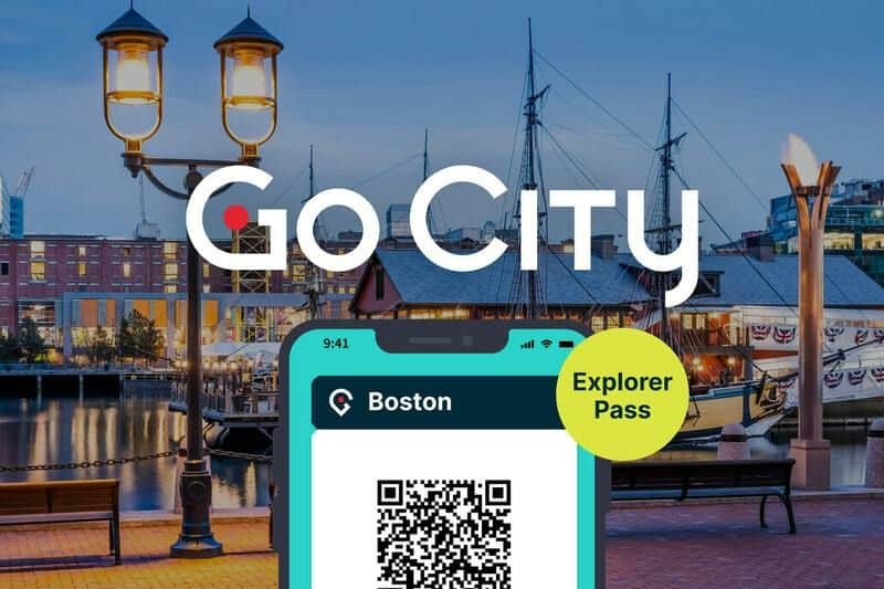 A lit harbor scene with ships, a smartphone showing a QR code for a "Go City Boston Explorer Pass," and "Go City" text above.