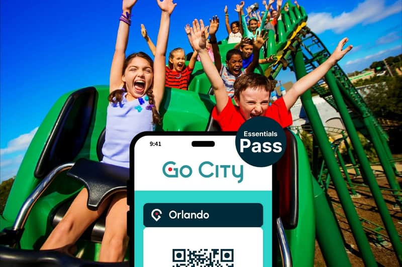 Children riding a roller coaster, with a digital pass for Go City Orlando displayed in the foreground.