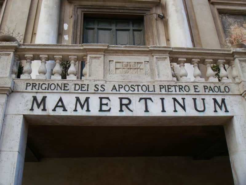 Mamertine Prison City Card (Rome) A stone entrance with a balustrade above it, featuring the text "PRIGIONE DEI SS APOSTOLI PIETRO E PAOLO MAMERTINUM."