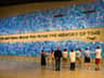 The 9/11 Memorial & Museum City Cards & Passes (New York) People standing before a wall of blue tiles with the inscription "NO DAY SHALL ERASE YOU FROM THE MEMORY OF TIME - Virgil."
