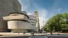 The Guggenheim City Cards & Passes (New York) A modern, spiral-shaped building on a city street corner, surrounded by trees and pedestrians walking.